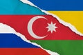 Ukraine, Russia, Azerbaijan flag ripped paper grunge background.