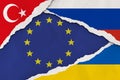 Ukraine, Russia, European union and Turkey flag ripped paper grunge background. Abstract Ukraine Russia politics conflicts