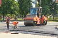 Ukraine,Shostka-June 14, 2019: A group of workers and construction machines for asphalt roads at the construction site
