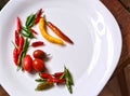 Ukraine Shostka still life vegetables paper tomatoes chilli witÃÂµ plate