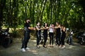 Ukraine, Tarnopol - September 8, 2018: Group of young girls at hen party on choppers and wear black leather dress with champagne. Royalty Free Stock Photo