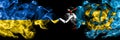 Ukraine, Ukrainian vs France, French, Saint-Pierre and Miquelon smoky mystic flags placed side by side. Thick colored silky