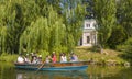 Ukraine - Uman, Sofiyivka Park - June 10, 2017: Tourists float on a boat to enjoy the lively landscapes.