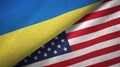 Ukraine and United States two flags textile cloth, fabric texture Royalty Free Stock Photo