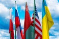 Flags in a one row on the cloudy sky background Royalty Free Stock Photo