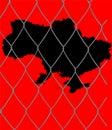 Ukraine vector map silhouette behind the prison wire. Royalty Free Stock Photo