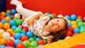 Ukraine Vinnitsa 09 27 2023 Girl with Down syndrome playing with geometrical shapes Royalty Free Stock Photo
