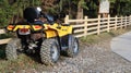 Ukraine, Yaremche - November 20, 2019: photo of a yellow ATV station wagon. four-wheeled car. four-wheel all-terrain vehicle,