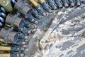 Ukrainian army fabric and machine gun belt shells lies on ukrainian pixeled military camouflage