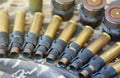 Ukrainian army fabric and machine gun belt shells lies on ukrainian pixeled military camouflage