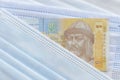 Ukrainian banknote hryvnya on mask Royalty Free Stock Photo