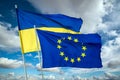 Ukrainian blue and yellow bicolor national flag on blue sky background Royalty Free Stock Photo