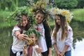Ukrainian children in embroidered shirts taking selfie