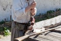 Loading a powder to the barrel of an antique shotgun