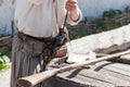 Loading a powder to the barrel of an antique shotgun