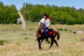 Ukrainian cossack riding a horse during ethno-rock festival Kozak Fest