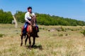Ukrainian cossack riding a horse during ethno-rock festival Kozak Fest