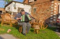 Ukrainian country-man playing button accordion