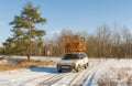 Ukrainian craftsman transports his handmade furniture on a roof of own automobile