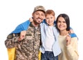 Ukrainian defender in military uniform and his family with flag on white background Royalty Free Stock Photo