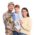 Ukrainian defender in military uniform and his family with flag on white background Royalty Free Stock Photo