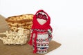 Ukrainian doll Motanka, sandals and basket on burlap Royalty Free Stock Photo