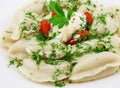 Ukrainian dumplings with sour cream