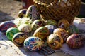 Ukrainian Easter eggs `pysanky` beside a basket