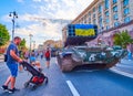 Ukrainian flag atop destroyed Russian multiple rocket launcher Solntsepyok TOS-1, Khreshchatyk Avenue, Kyiv, Ukraine