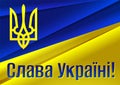 Ukrainian flag and coat of arms with the slogan `Glory to Ukraine` in Ukrainian language.