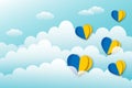 Ukrainian flag heart shape with clouds on sky blue background, Concept for Peace and stop the war. Royalty Free Stock Photo