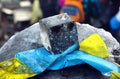 Ukrainian flag pressed to a stone