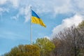 Ukrainian flag waving in the wind against the sky Royalty Free Stock Photo