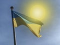 Ukrainian flag waving in the wind and sun