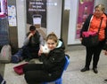 Ukrainian girl holding pet rabbit at railway stationin Cracow, Poland.