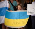 Ukrainian girl holds anti-war sign at rally in support of Mariupol against Russian invasion of Ukraine