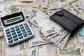 Ukrainian hryvnias bills with purse calculator. Money of Ukraine. Royalty Free Stock Photo