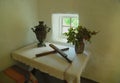 Ukrainian like peasant dwelling interior with various home articles. Museum