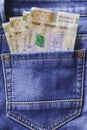 Ukrainian money. New banknotes five hundred hryvnia bills UAH in the back pocket of blue jeans. Money concept Royalty Free Stock Photo