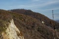 Ukrainian mountains. Lonely house in the forest and clay rock