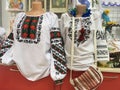 Ukrainian national clothes. Women`s shirts on the mannequin