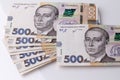 The Ukrainian national currency is the hryvnia. Several new 500 hryvnia UAH bills on a white background. Financial background with Royalty Free Stock Photo