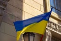 The Ukrainian national flag flutters over the entrance to the polling station. presidential elections in Ukraine in 2019