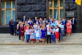 Ukrainian officials and ministers near the Building of Cabinet of Ministers during celebration of Day of State Flag of Ukraine in