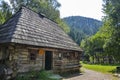 Ukrainian old-fashioned wooden house among the Carpathian mountains in Kolochava village Royalty Free Stock Photo