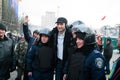 Ukrainian opposition politician Vitali Klitschko photographed with a detachment of policemen during anti-government protest