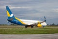 Ukrainian passenger plane AZURAIR Boeing 737-800 UR-UTQ. Airport apron. Aircraft on runway. Airplane arrives. Ukraine Royalty Free Stock Photo