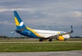 Ukrainian passenger plane AZURAIR Boeing 737-800 UR-UTQ. Airport apron. Aircraft on runway. Airplane arrives. Ukraine Royalty Free Stock Photo