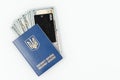 Ukrainian passport, credit card and dollars. Ukrainian passport on a white background, top view