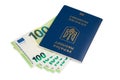 ukrainian passport and 100 euro banknotes on white